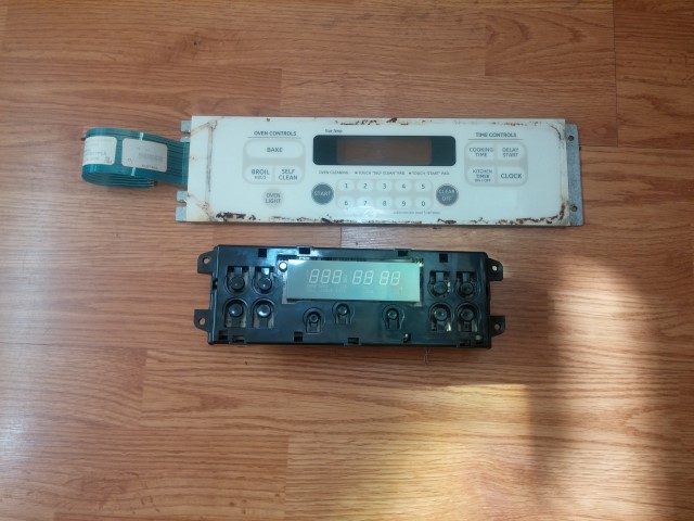Showing the removed LCD Control Panel Module removed from GE Range